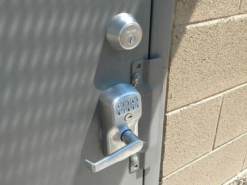 CallOrange.com locksmith installing a keypad deadbolt in Tempe, AZ